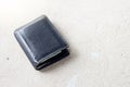 Black wallet on floor. Royalty Free Stock Photo