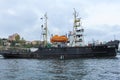 Black warship in the port of Sevastopol. Side view. Russian ships on combat duty.