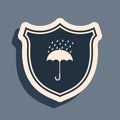 Black Waterproof icon isolated on grey background. Shield and umbrella. Protection, safety, security concept. Water