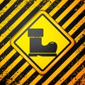 Black Waterproof rubber boot icon isolated on yellow background. Gumboots for rainy weather, fishing, gardening. Warning