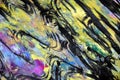 Dark yellow black waves splashes, colorful vivid waxy colors, contrasts creative background Royalty Free Stock Photo