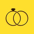 Black Wedding rings icon isolated on yellow background. Bride and groom jewelery sign. Marriage icon. Diamond ring. Long