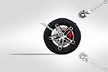 Black wheel of racing car with modified with chrome ratchet spanner wrench