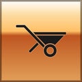 Black Wheelbarrow icon isolated on gold background. Tool equipment. Agriculture cart wheel farm. Vector