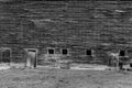 black and white Abandoned weathered barn, close-up view rustic wall Royalty Free Stock Photo