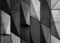 Black and white abstract background with geometric shapes of metal wall panels. Modern architecture concept. Black, gray Royalty Free Stock Photo