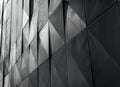 Black and white abstract background with geometric shapes of metal wall panels. Modern architecture concept. Black, gray Royalty Free Stock Photo
