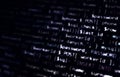 Black white abstract computer code. White programming code on black background. Royalty Free Stock Photo