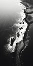 Black And White Aerial View Photography Of Ocean Coastline And Rocky Shoreline