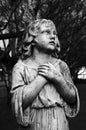 Black and White Angel Sculpture in Churchyard Cemetery