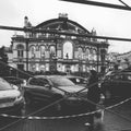 A black and white artistic look at the Kyiv Opera House in the rain