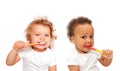 Black and white baby toddlers brushing teeth Royalty Free Stock Photo