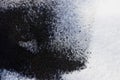 Black and white texture from the ashes of a fire and snow Royalty Free Stock Photo
