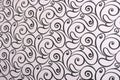 Black-and-white background with curlicues