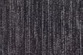 Black and white background of a knitted textile material. Fabric with a striped texture closeup. Royalty Free Stock Photo