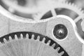 Black white background with metal cogwheels a clockwork. Conceptual photo. Macro Royalty Free Stock Photo