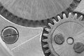 Black white background with metal cogwheels a clockwork. Conceptual photo. Macro Royalty Free Stock Photo