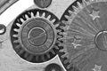 Black white background with metal gear wheels of the old clockwork. Conceptual photo for successful business design. Macro Royalty Free Stock Photo