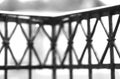 Black and white balcony fence with rain drops background