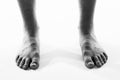 Black and white barefoot male feet Royalty Free Stock Photo