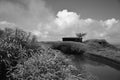 Black and white beautiful farm house, far from city like with beautiful view, a small house sky covered with clouds and a lake Royalty Free Stock Photo