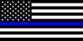 A black, white and blue stars and stripes USA American flag in memorial of Police Officers that have died in the line of duty Royalty Free Stock Photo