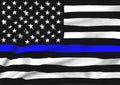 A black, white and blue waving stars and stripes USA American flag in memorial of Police Officers that have died in the line of Royalty Free Stock Photo