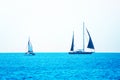 Black and white boat sailing in the open blue sea in Greece Royalty Free Stock Photo