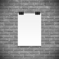 Black and white brick wall and paper poster for text, backgrpund mock up. Realistic black paper clamp. For Your business project.