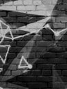 Black and white brick wall texture with graffiti Royalty Free Stock Photo
