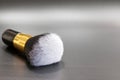 Black white brush for blush. With a gold ring, horsehair hair