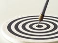 Black and white bullseye dart arrow hitting target center of dartboard. Concept of success, target, goal, achievement. Royalty Free Stock Photo