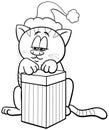 cartoon cat with gift on Christmas time coloring page Royalty Free Stock Photo