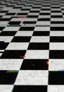 A black and white checkerboard pattern extends into the distance, creating a sense of Royalty Free Stock Photo