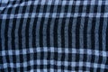 Checkered fabric texture on a woolen piece of clothing