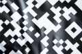 Black and white checkered glossy paper background as background close-up Royalty Free Stock Photo