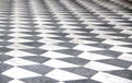 Black and white checkered marble floor pattern