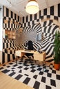 A black and white checkered room with a desk. Generative AI image.