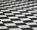 Checkered black and white tile floor Royalty Free Stock Photo