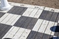 black and white chess outdoor large chess board with chess pieces Royalty Free Stock Photo