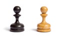 Black and white chess pawns on a white background. Royalty Free Stock Photo