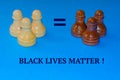 Black and white chess pieces on a blue background. The inscription Stop racism. Black lives matter