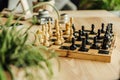 Black and white chess pieces on chessboard during the game