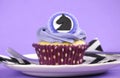 Black and white chevron with purple theme party cupcake. Royalty Free Stock Photo