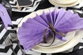 Black and white chevron with purple theme party luncheon table closeup.