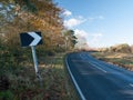 Black and white chevron road sign turn way no cars country