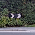 Black and white chevron sign pointing right