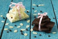Black and white chocolate, almond petals and chocolate drops