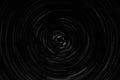 Black and white circular blur in the form of a whirl background texture, radial blur, abstract twist, funnel