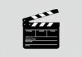 Black and white clapperboard illustration on a light gray Royalty Free Stock Photo